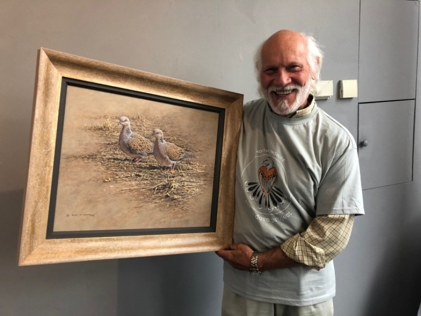 Alan Hunt with his donated Turtle Dove original art work
