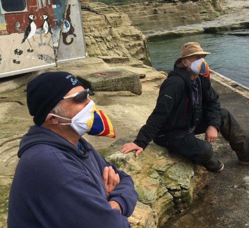 The wardens on Coquet sporting their very smart Covid Puffin masks